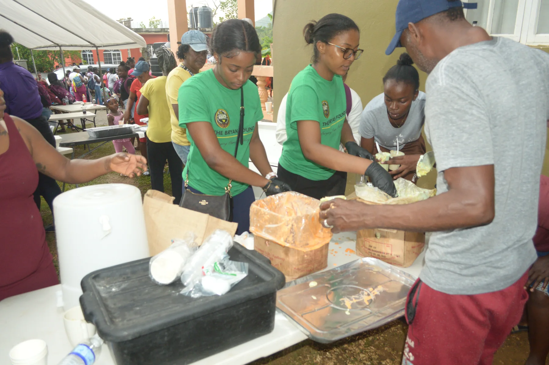 Volunteers serving food